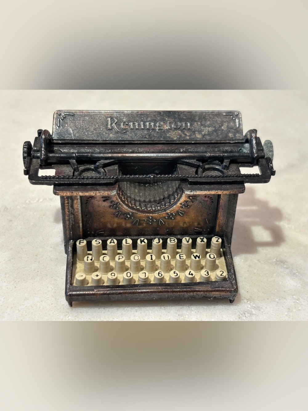 Remington typewriter pencil sharpener made of die-cast metal trinket renington